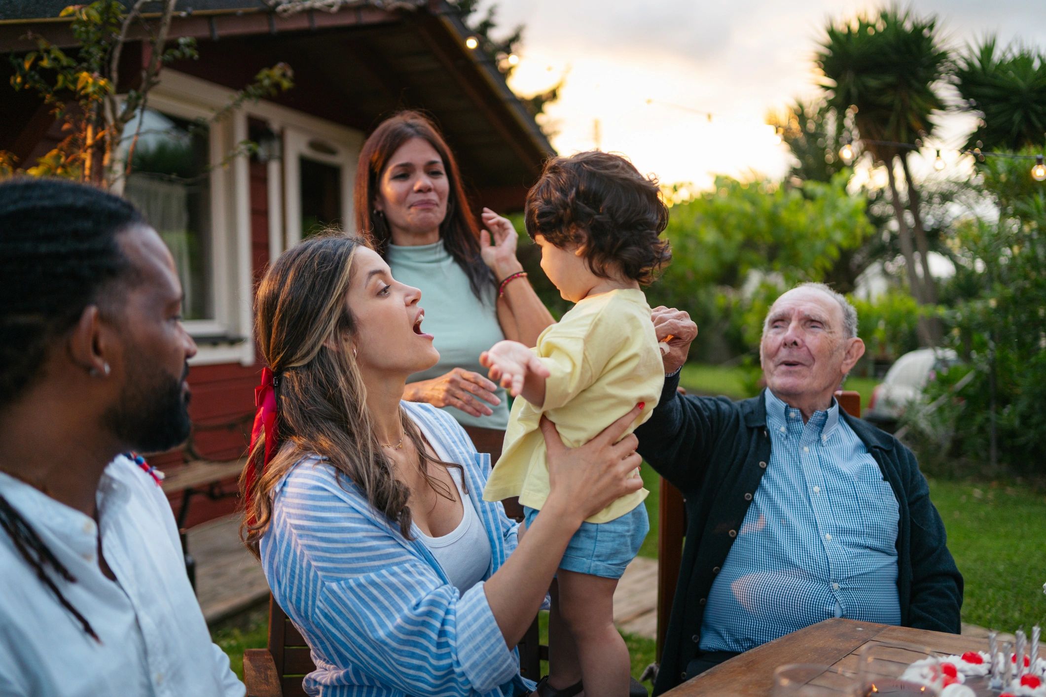 Family gathered together outdoors during a photo session